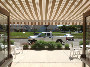 Commercial Awnings - Conifer Village Retractable Awning